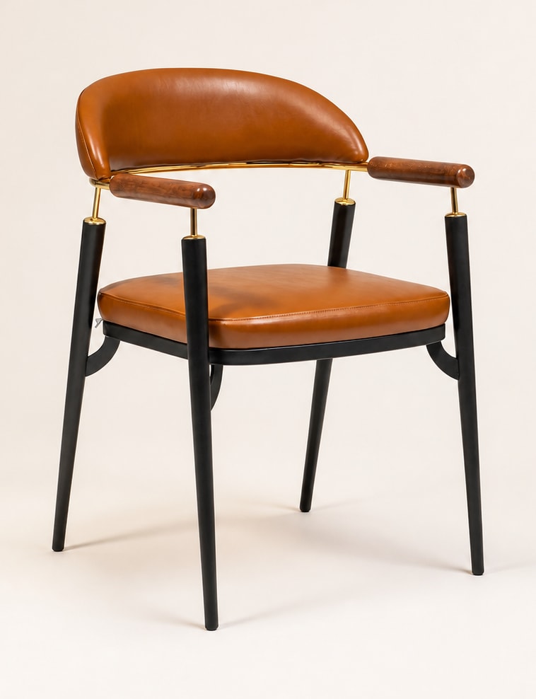Odin armchair with cognac-toned upholstery and dark legs