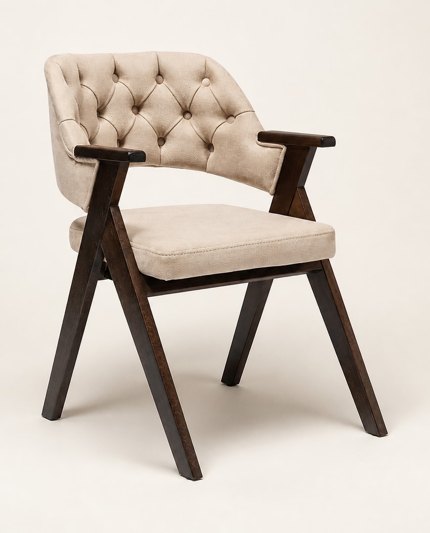 Tolex armchair with light button-detail upholstery